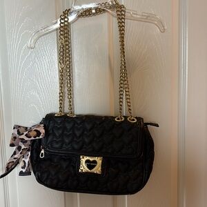 Black and Pink Heart Quilted Shoulder Bag. Has peeling and shows wear and tear.